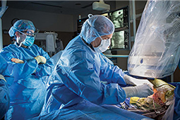 Image of cardiologists in an operating room
